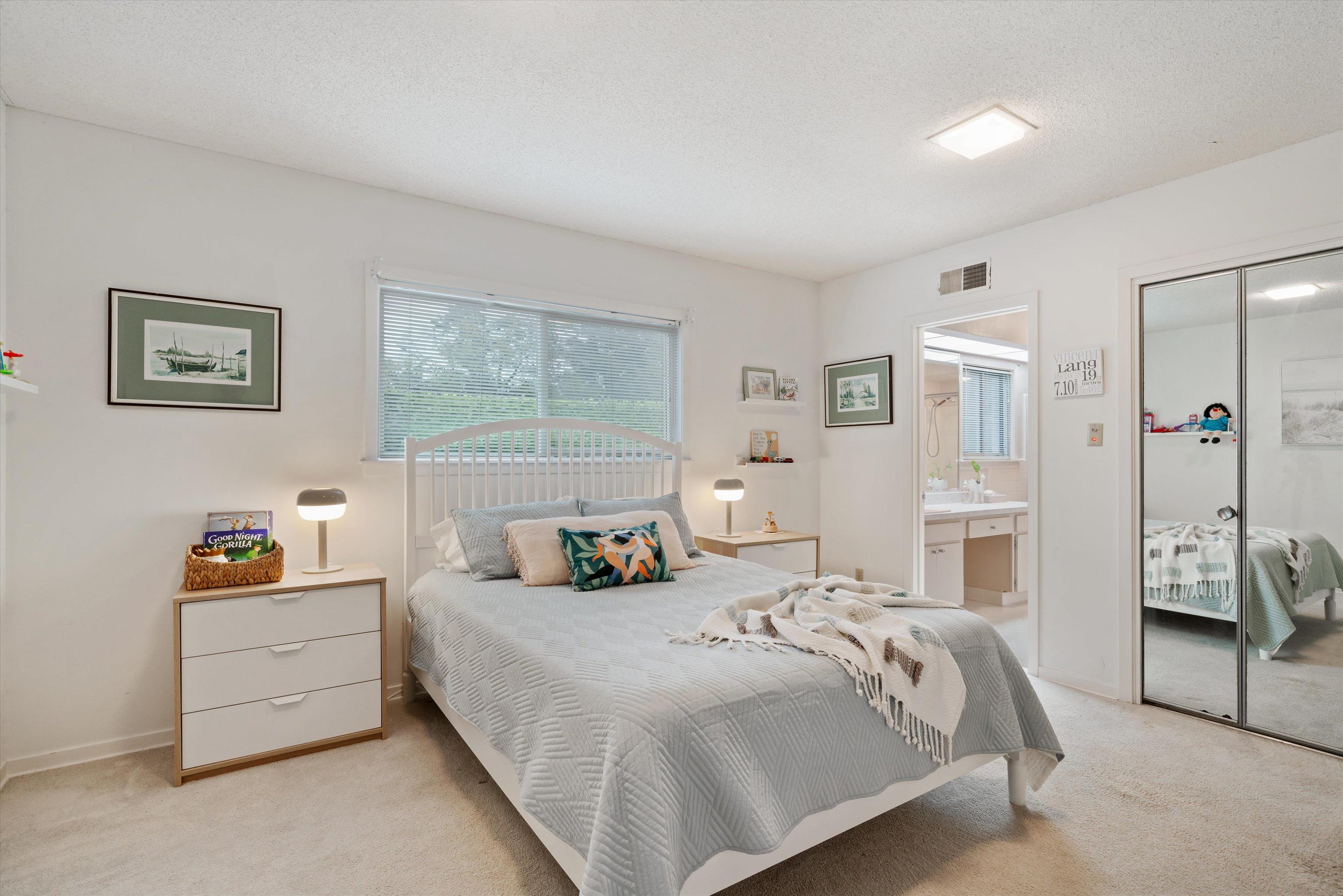 180 South Grove Park Road Memphis, TN 38117 - Photo 25 of 39 a bedroom with a bed dresser and a window