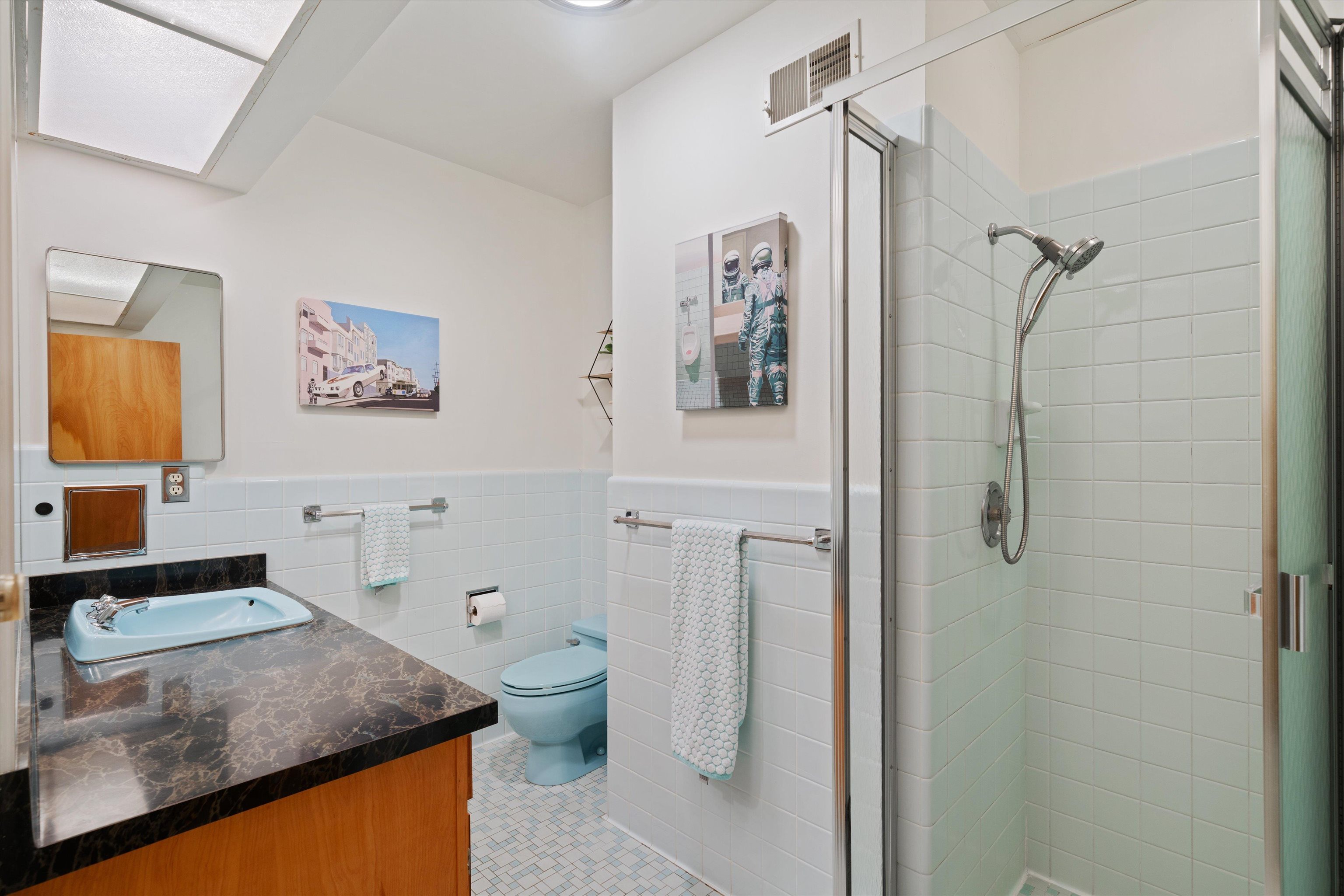 180 South Grove Park Road Memphis, TN 38117 - Photo 28 of 39 a bathroom with a granite countertop sink a toilet and shower