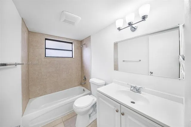 a view of a room with a bathroom