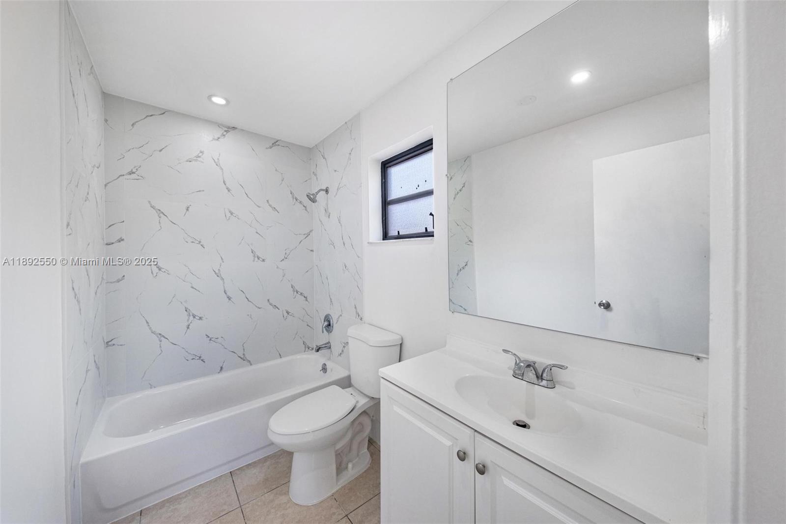 1283 West 42nd Street Hialeah, FL 33012 - Photo 44 of 54 a bathroom with a sink a toilet and shower