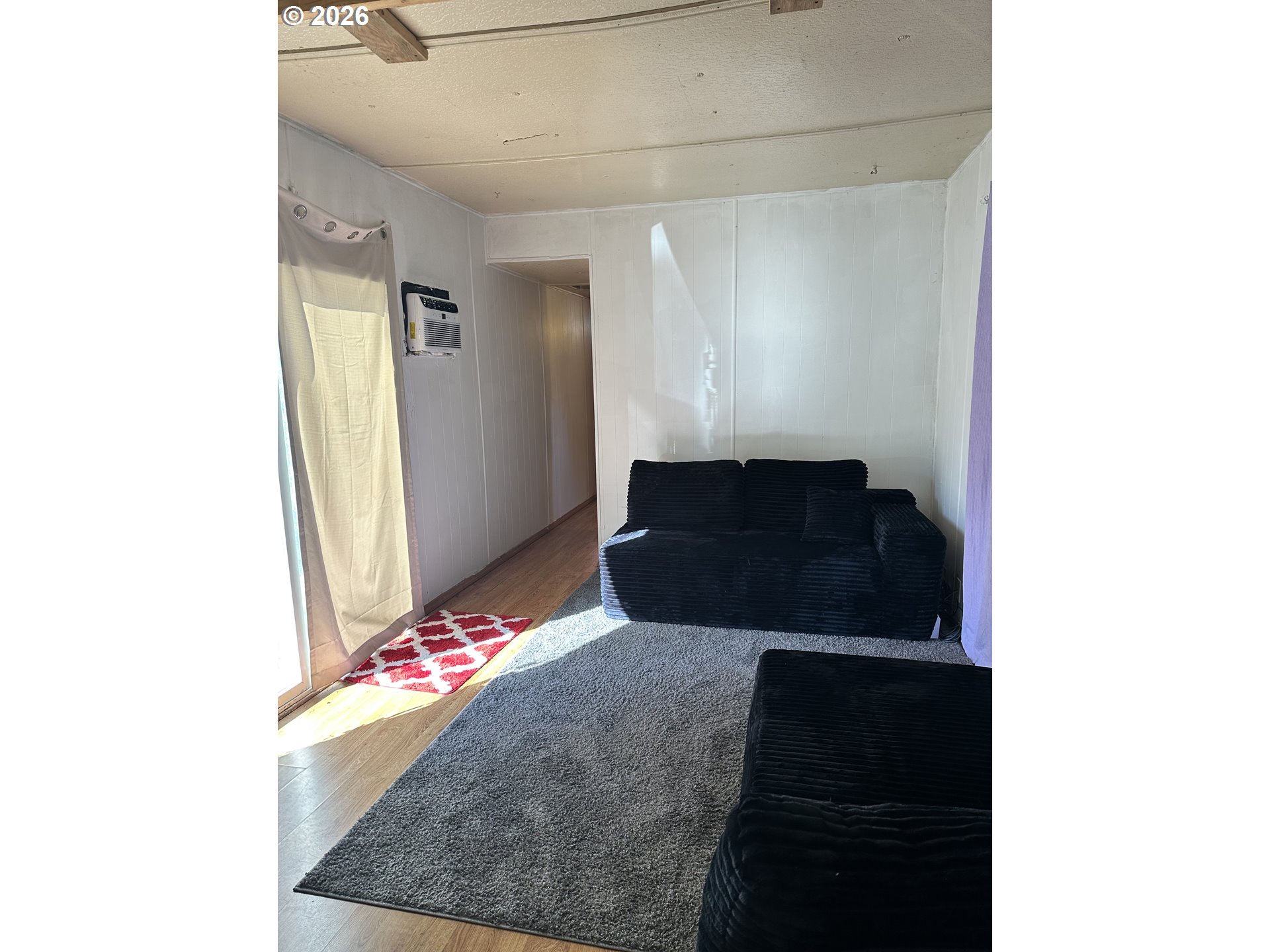 37635 Row River Road, Unit 7 Dorena, OR 97434 - Photo 14 of 27 a bedroom with a bed and a dresser