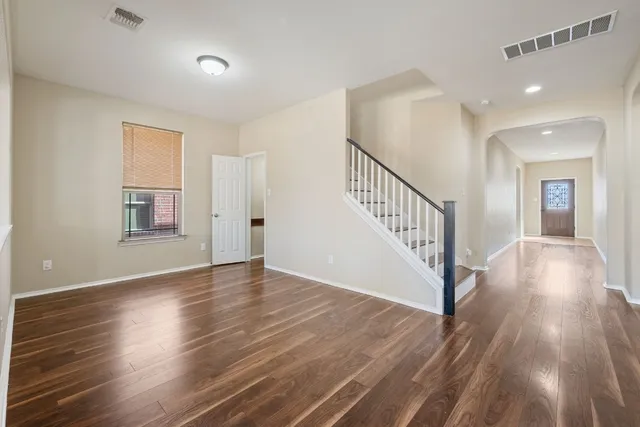 a view of kitchen with wooden floor