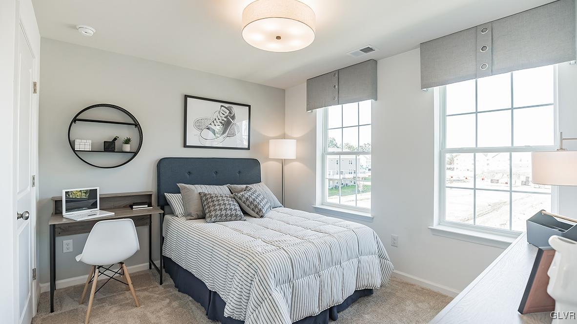 257 Winding Road Easton, PA 18040 - Photo 14 of 23 a bedroom with a bed and a window