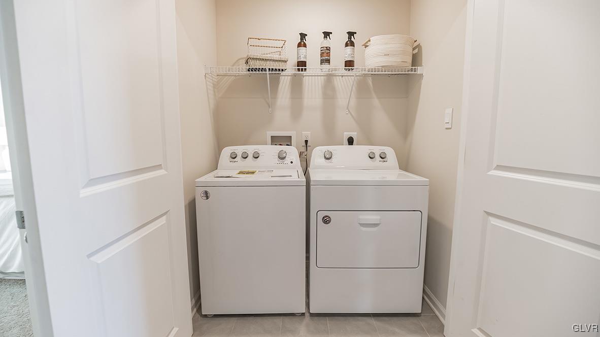 257 Winding Road Easton, PA 18040 - Photo 21 of 23 a utility room with dryer and washer