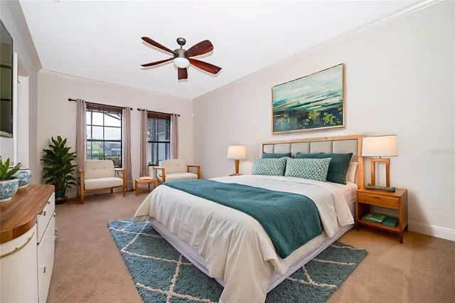 a bedroom with a bed a couch and a potted plant