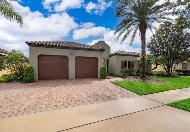 front view of a house with a garden