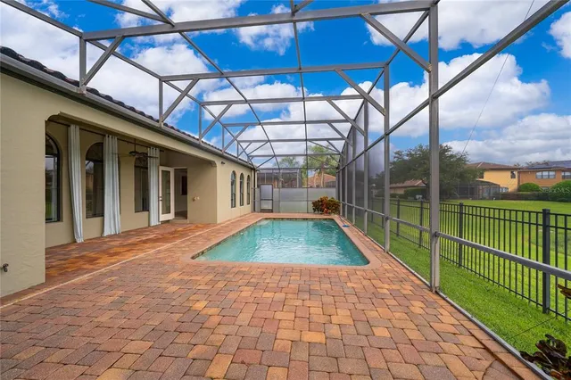 a view of a backyard with a tv