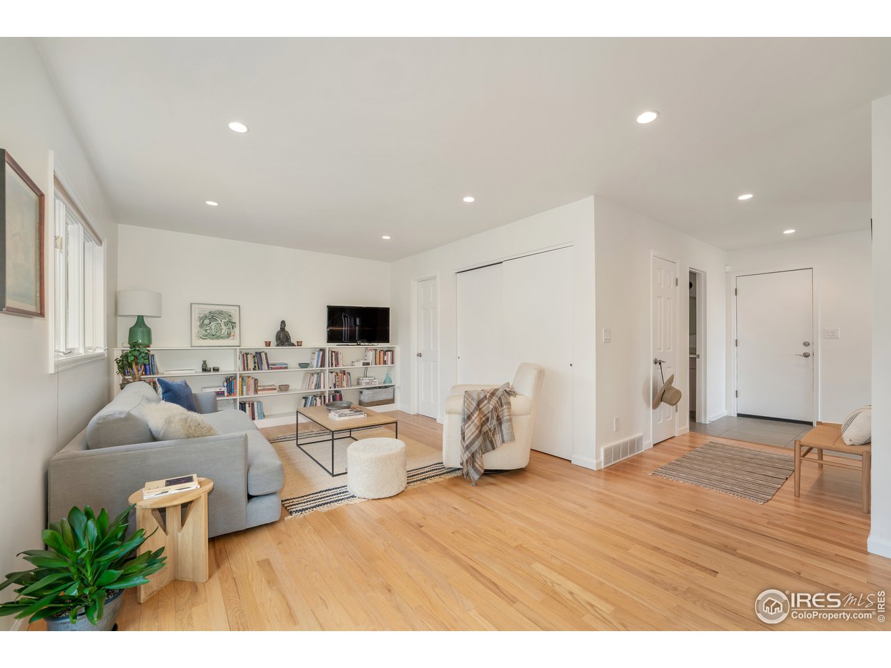 9042 Thunderhead Drive Boulder, CO 80302 - Photo 10 of 40 a living room with furniture and a flat screen tv