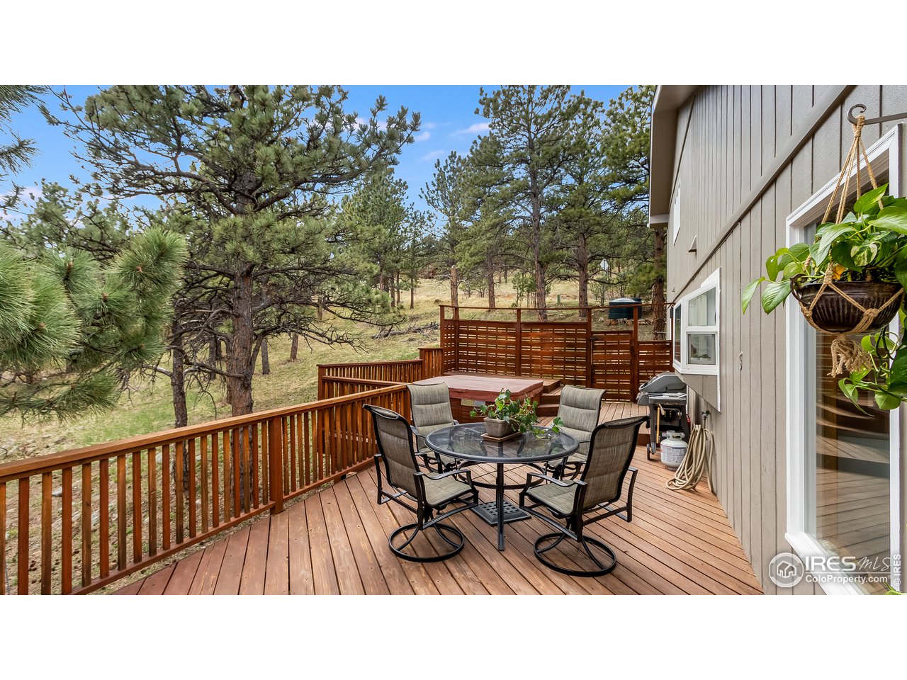 9042 Thunderhead Drive Boulder, CO 80302 - Photo 12 of 40 a balcony with table and chairs