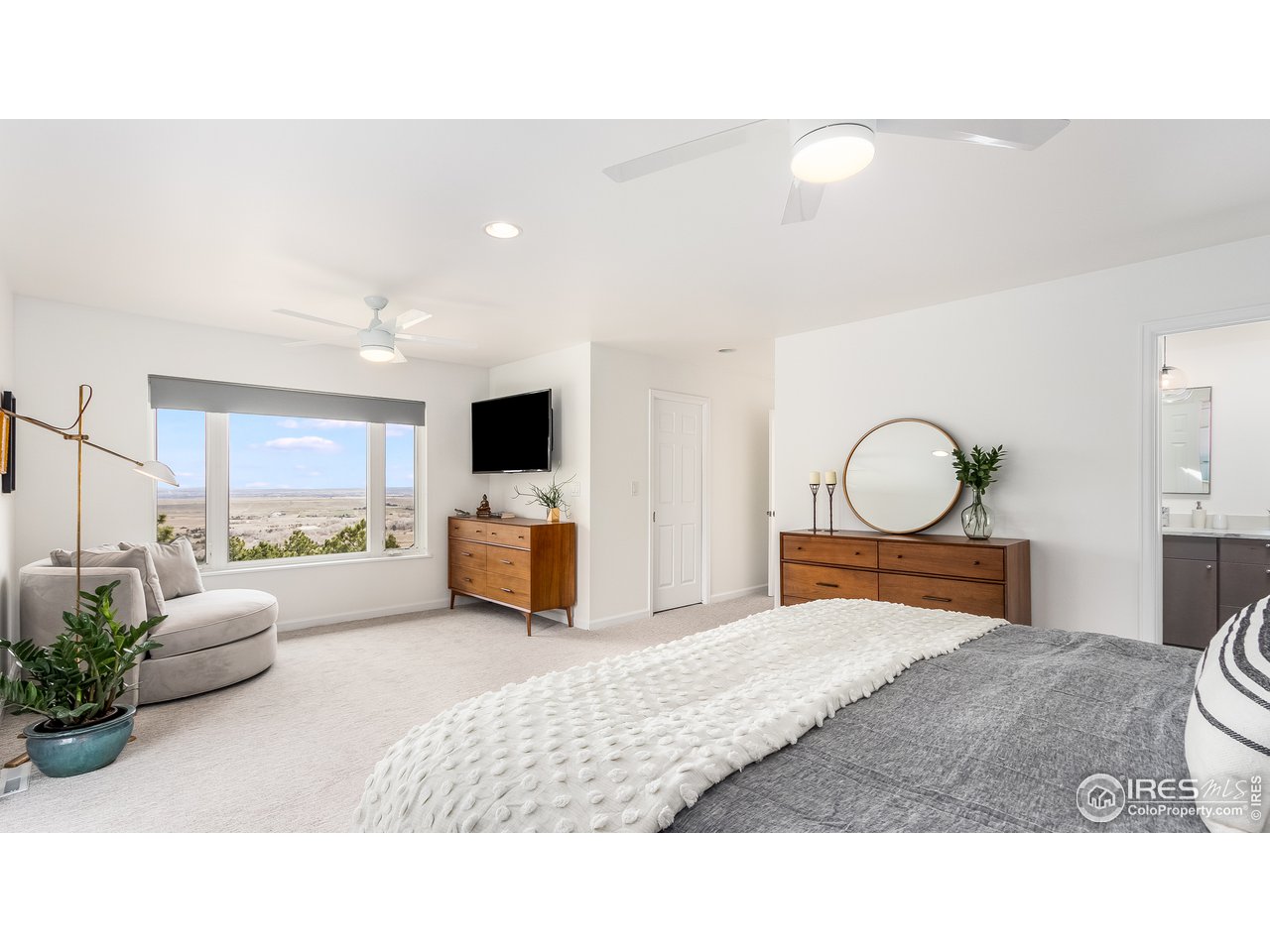 9042 Thunderhead Drive Boulder, CO 80302 - Photo 17 of 40 a living room with furniture a computer and a view of living room