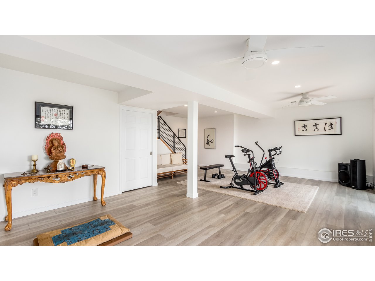 9042 Thunderhead Drive Boulder, CO 80302 - Photo 25 of 40 a living room with furniture a window and gym equipment
