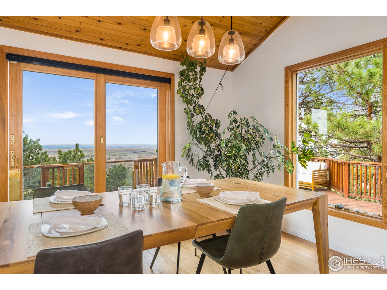 9042 Thunderhead Drive Boulder, CO 80302 - Photo 5 of 40 a dining room with furniture and a large window