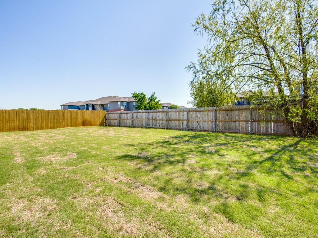 4113 Bridle Path Lane Sanger, TX 76266 - Photo 24 of 25 a view of swimming pool with a yard