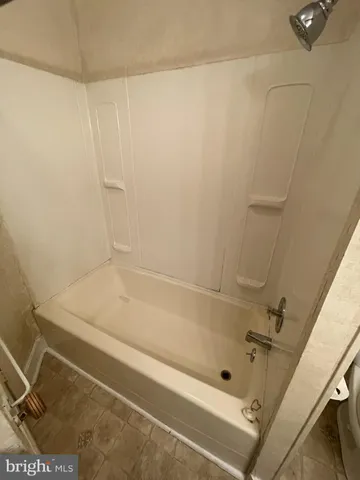 a bathroom with a toilet and a sink