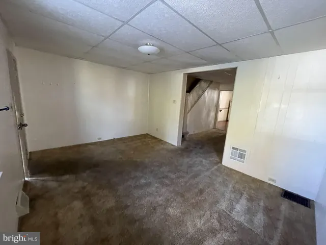 a view of a livingroom with a staircase