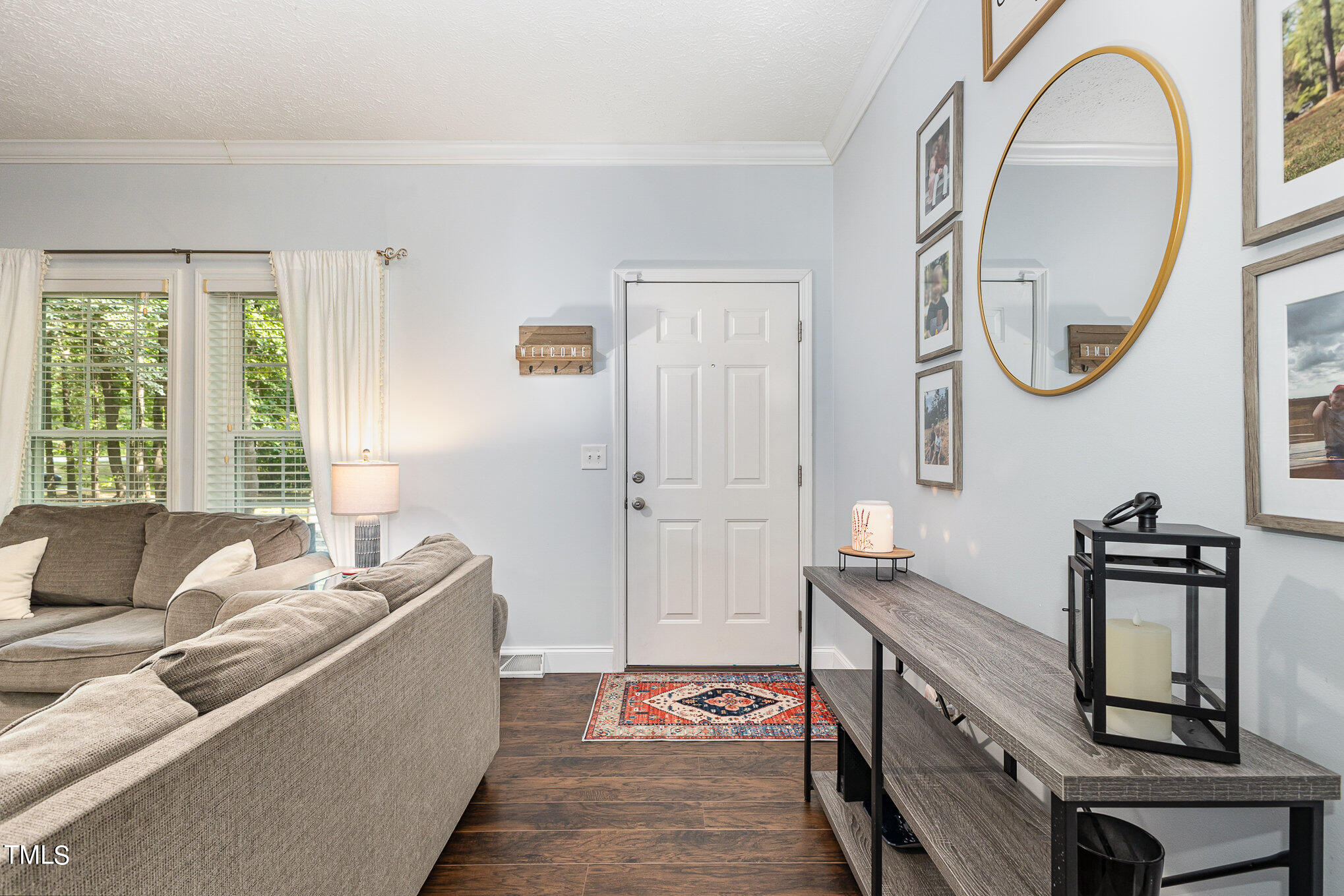 104 Dove Road Creedmoor, NC 27522 - Photo 3 of 25 a living room with furniture and a window