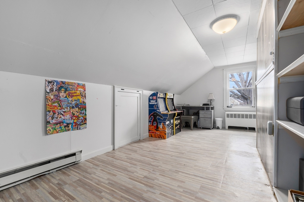 159 Jenness Street Lynn, MA 01904 - Photo 14 of 36 a view of a livingroom with furniture and a garage