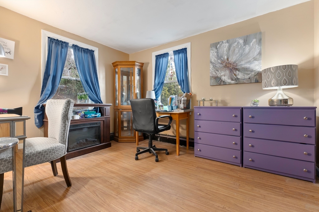 159 Jenness Street Lynn, MA 01904 - Photo 8 of 36 a view of a workspace with furniture and a window