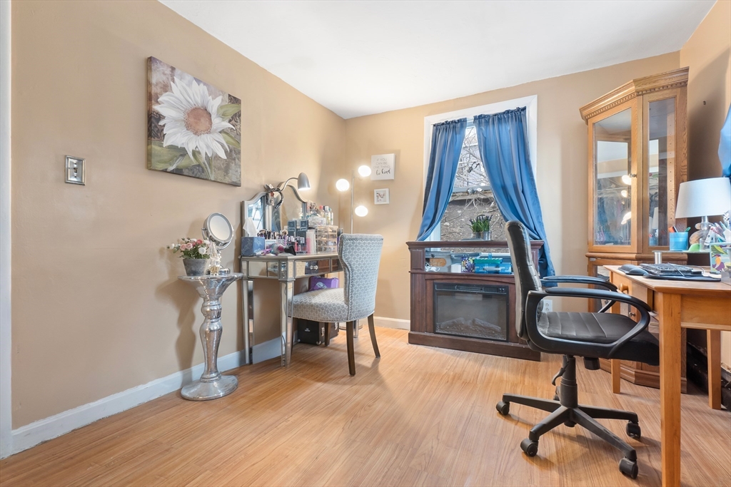 159 Jenness Street Lynn, MA 01904 - Photo 10 of 36 a view of a workspace with furniture and a window