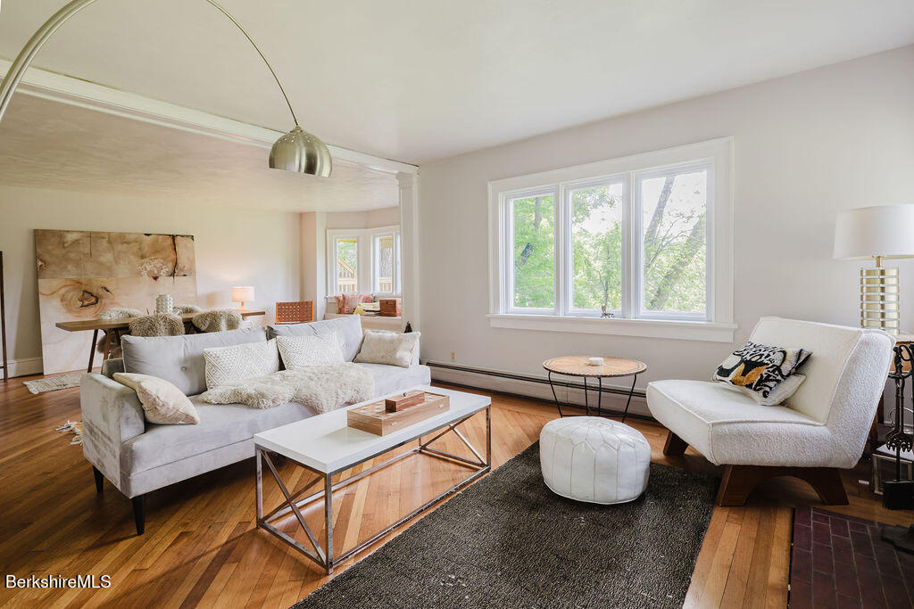 168 Main Street Sheffield, MA 01257 - Photo 11 of 55 a living room with furniture and a large window
