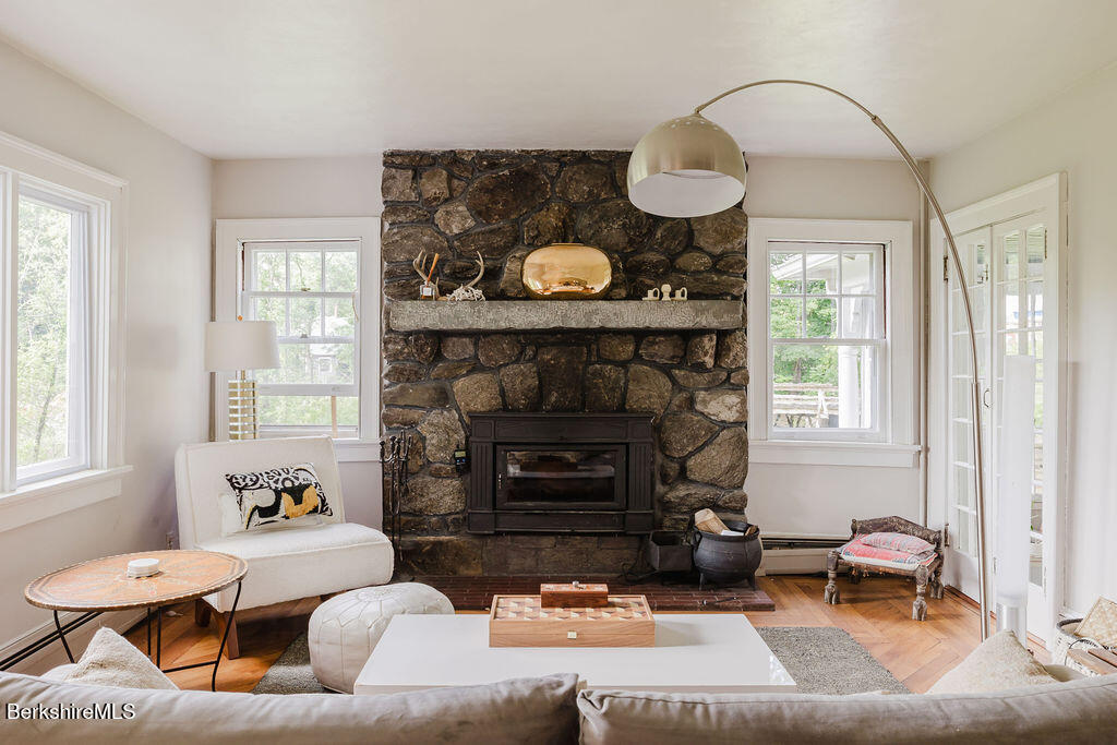 168 Main Street Sheffield, MA 01257 - Photo 12 of 55 a living room with furniture and a fireplace