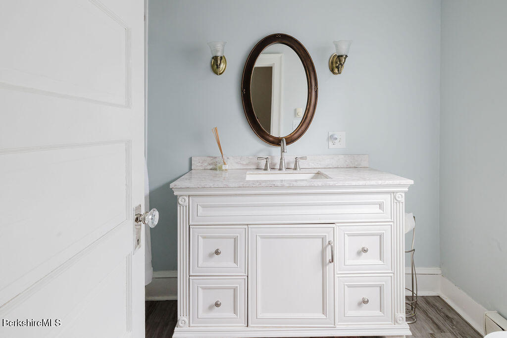 168 Main Street Sheffield, MA 01257 - Photo 16 of 55 a bathroom with a sink and a mirror