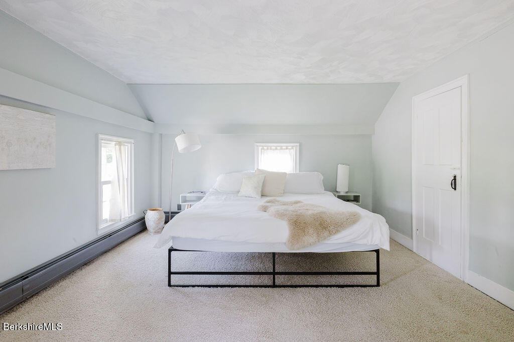 168 Main Street Sheffield, MA 01257 - Photo 23 of 55 a bedroom with a bed and window