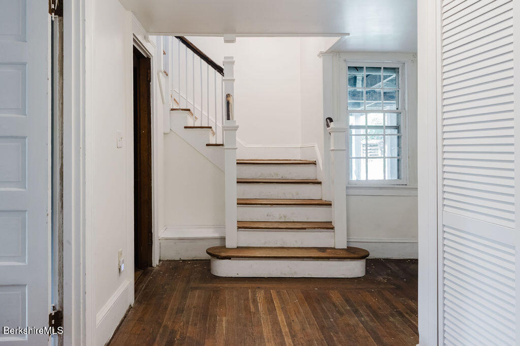 168 Main Street Sheffield, MA 01257 - Photo 26 of 55 a view of a hallway with wooden floor and staircase