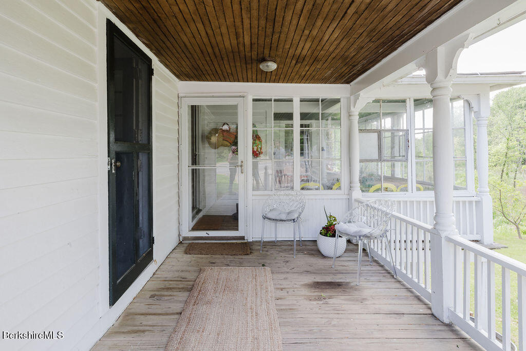 168 Main Street Sheffield, MA 01257 - Photo 29 of 55 a view of a porch with wooden floor and outdoor space