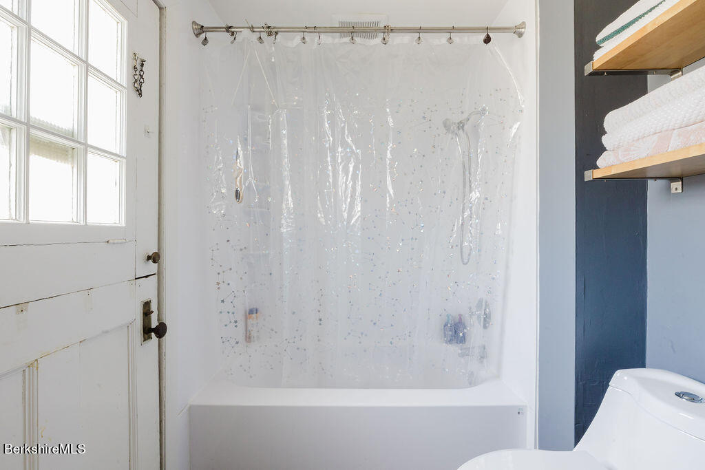 168 Main Street Sheffield, MA 01257 - Photo 38 of 55 a bathroom with a shower and a bathtub
