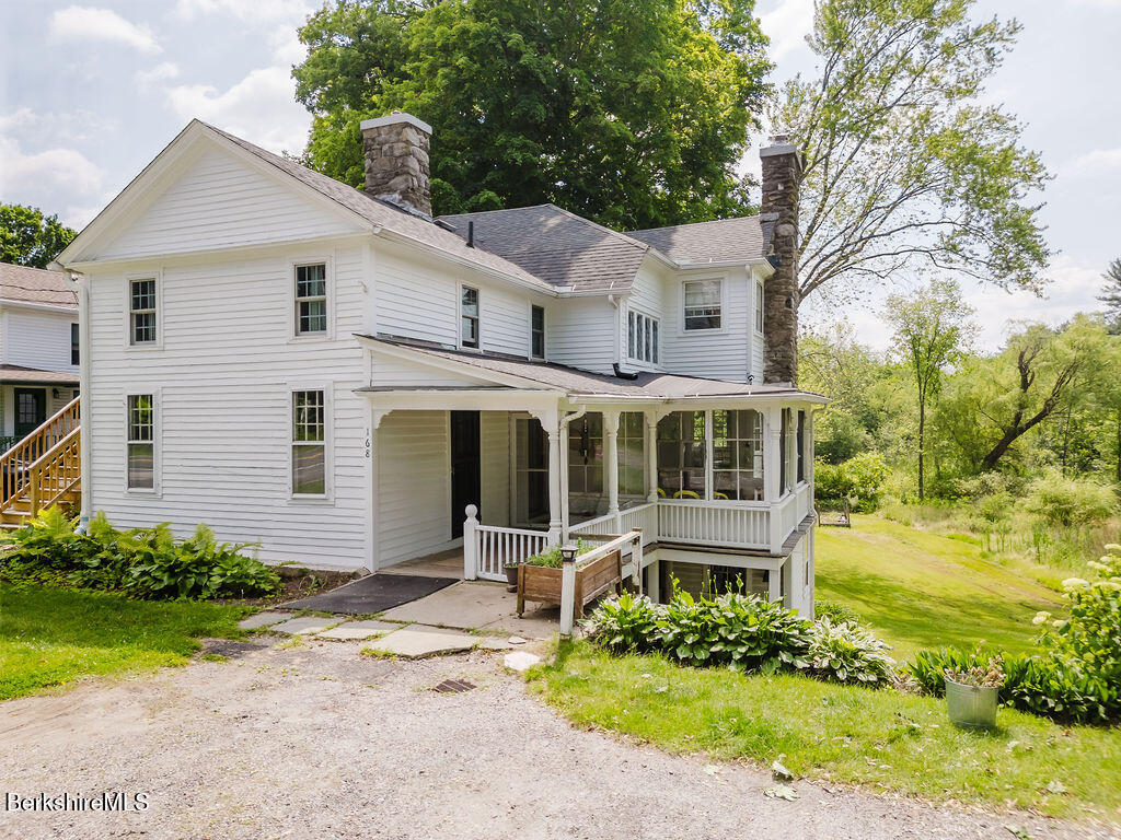 168 Main Street Sheffield, MA 01257 - Photo 54 of 55 a front view of a house with garden