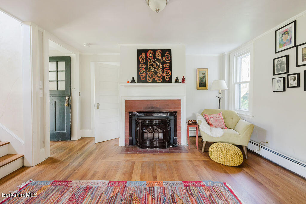 168 Main Street Sheffield, MA 01257 - Photo 7 of 55 a living room with furniture and a fireplace