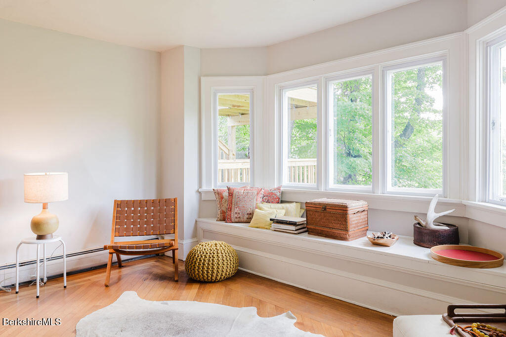 168 Main Street Sheffield, MA 01257 - Photo 10 of 55 a living room with furniture and floor to ceiling window