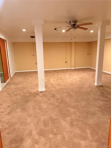 a view of an empty room with a flat screen tv