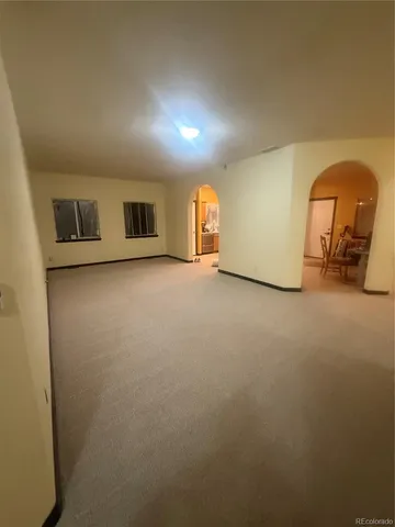 a view of a livingroom with a staircase