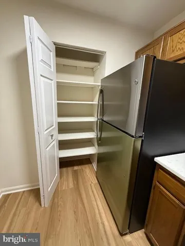 a view of small space with racks on the wall