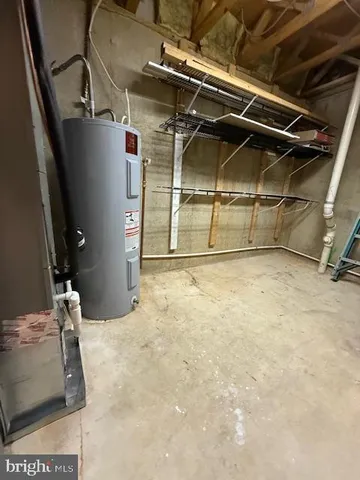 a view of a yard with large trees