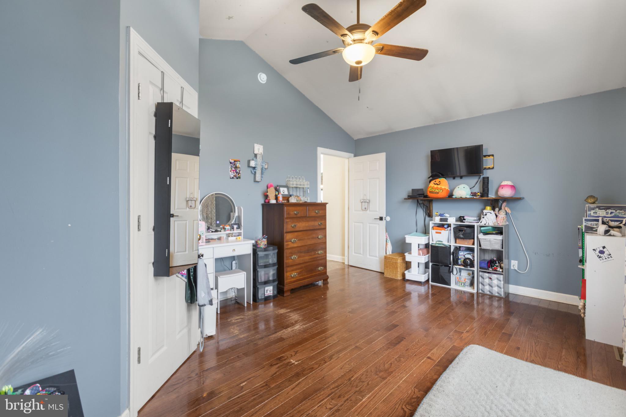 26179 Manor Way Georgetown, DE 19947 - Photo 28 of 87 a living room with furniture and a wooden floor