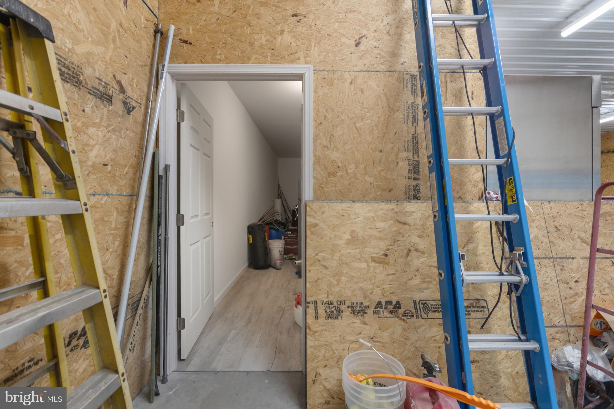 26179 Manor Way Georgetown, DE 19947 - Photo 41 of 87 Storage/ Man Cave Entrance