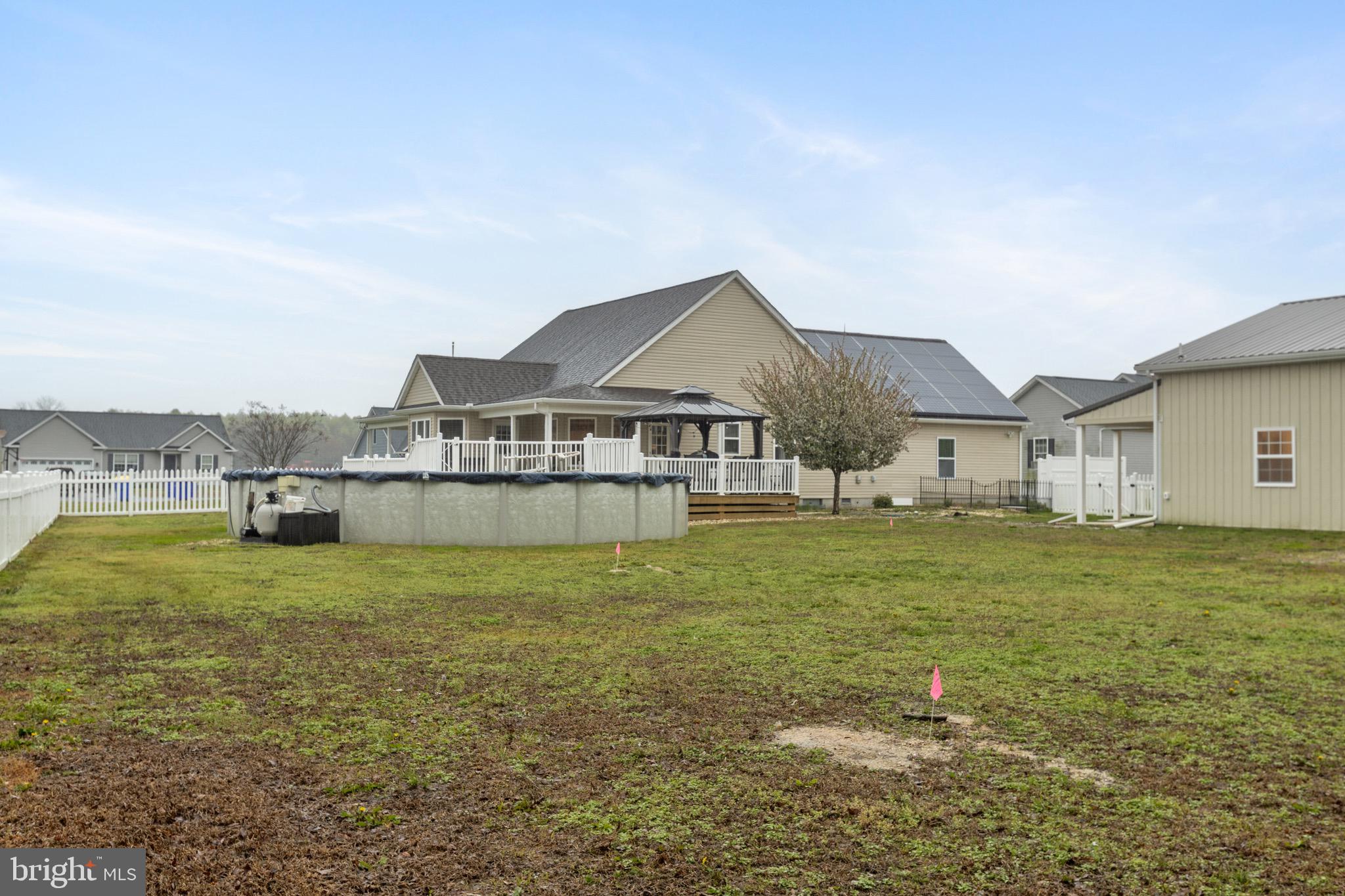 26179 Manor Way Georgetown, DE 19947 - Photo 61 of 87 a house view with a garden space
