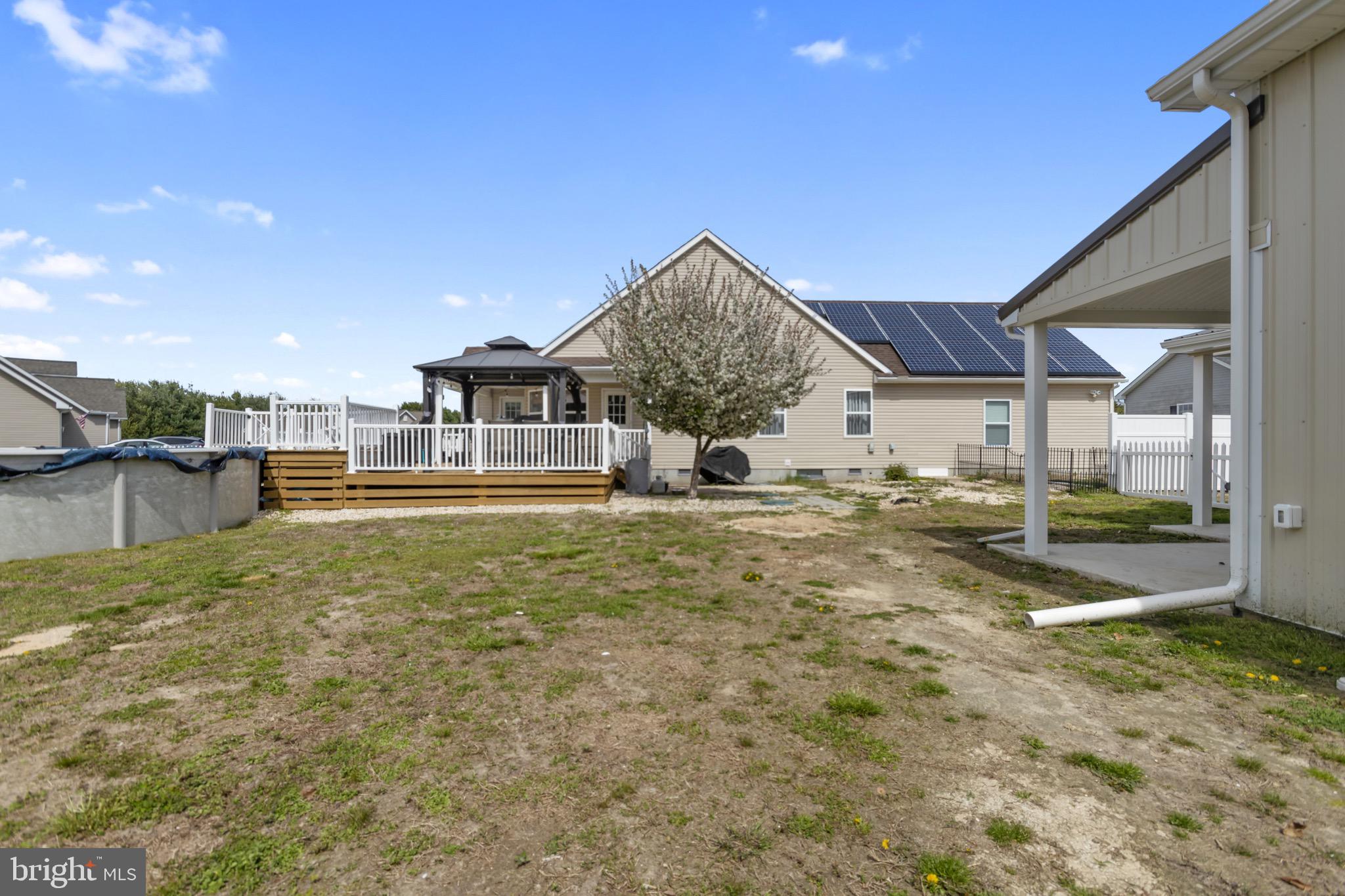 26179 Manor Way Georgetown, DE 19947 - Photo 71 of 87 a view of a house with a yard
