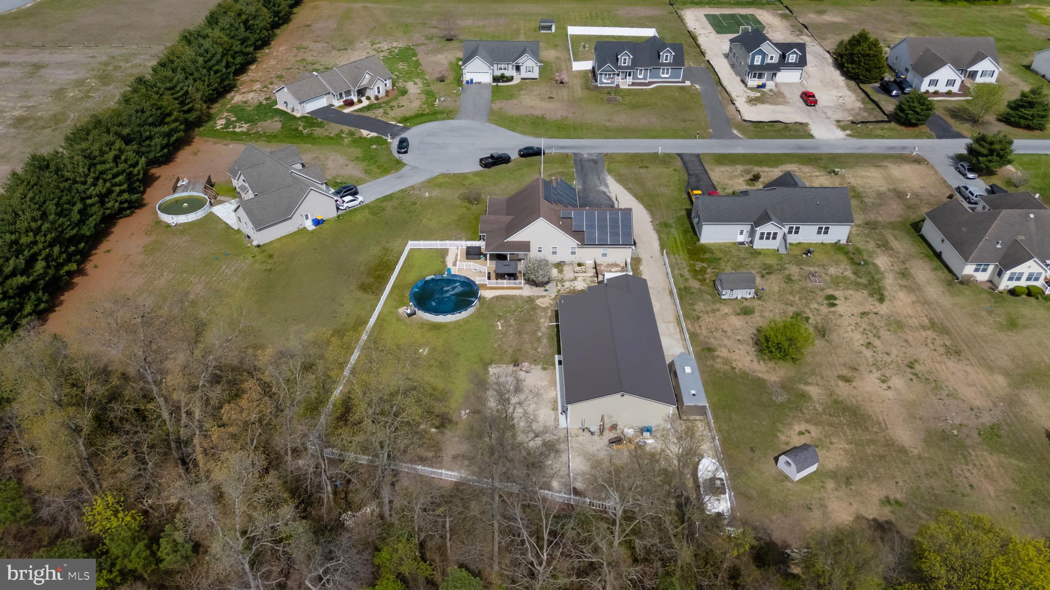 26179 Manor Way Georgetown, DE 19947 - Photo 87 of 87 an aerial view of a house with outdoor space