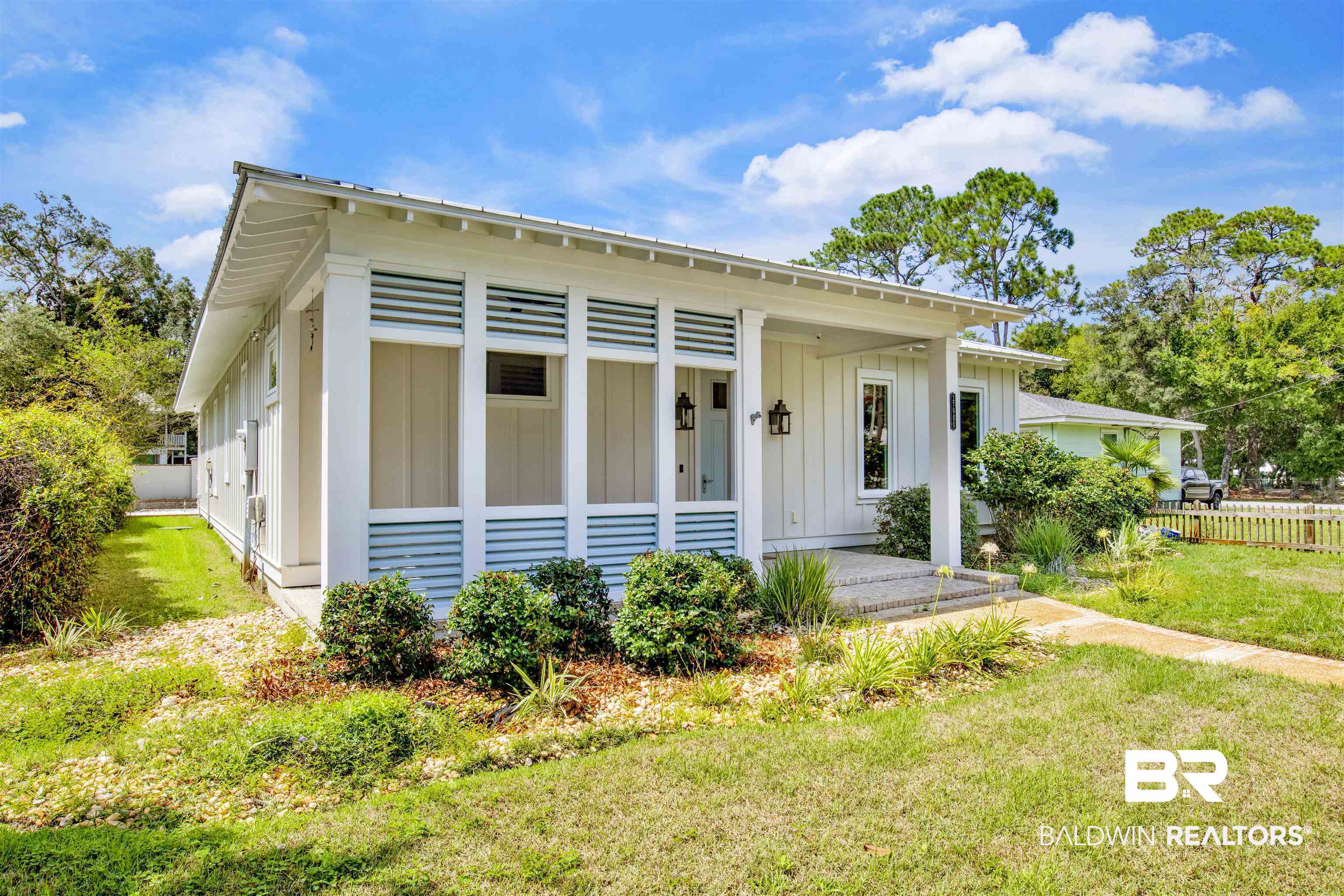 27980 Canal Road Orange Beach, AL 36561 - Photo 15 of 46 Bungalow-style house featuring board and batten siding