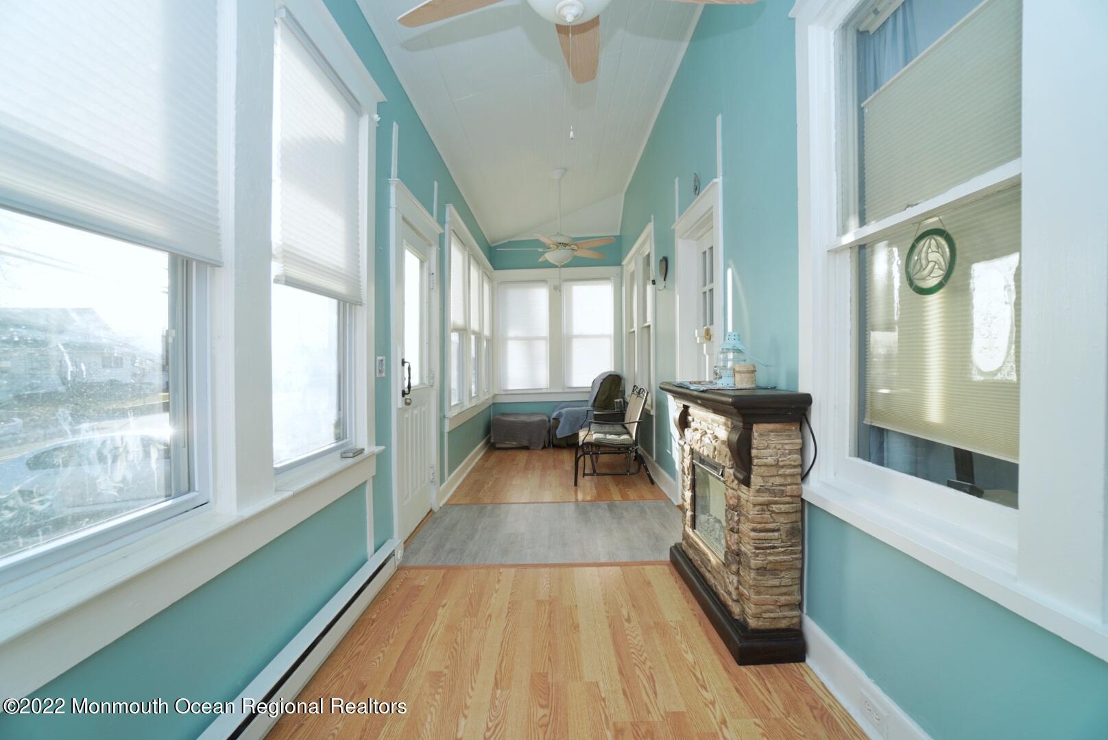 111 Stone Road Union Beach, NJ 07735 - Photo 5 of 57 Porch with Vaulted Ceiling