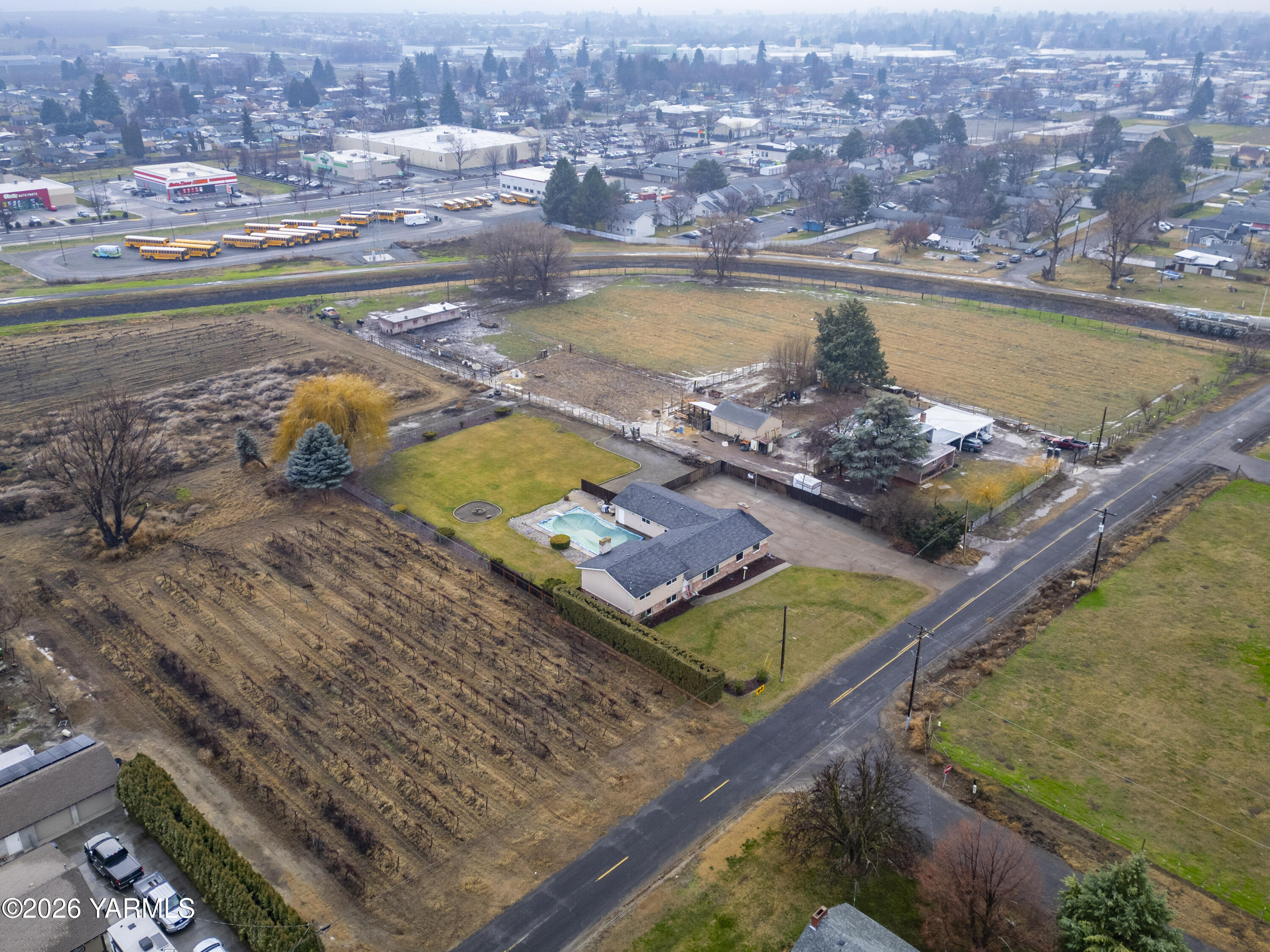 790 East Bonnieview Road Grandview, WA 98930 - Photo 2 of 49 an aerial view of a house with a lake view