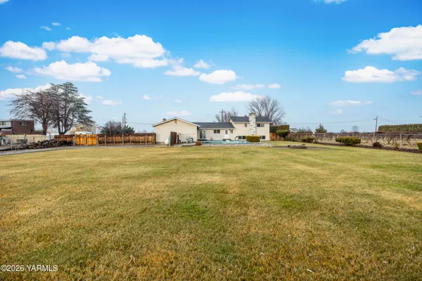 a view of outdoor space yard and swimming pool