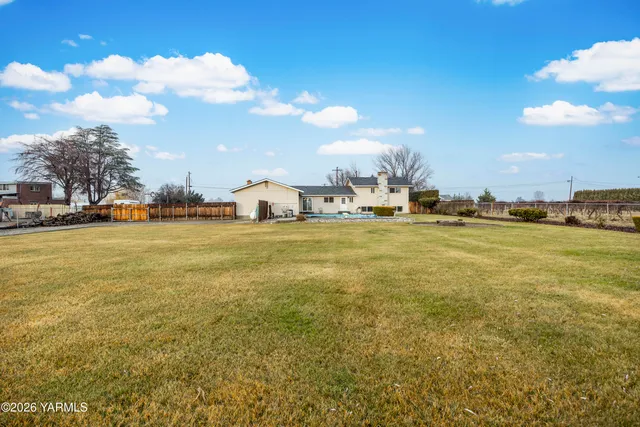 a view of outdoor space yard and swimming pool