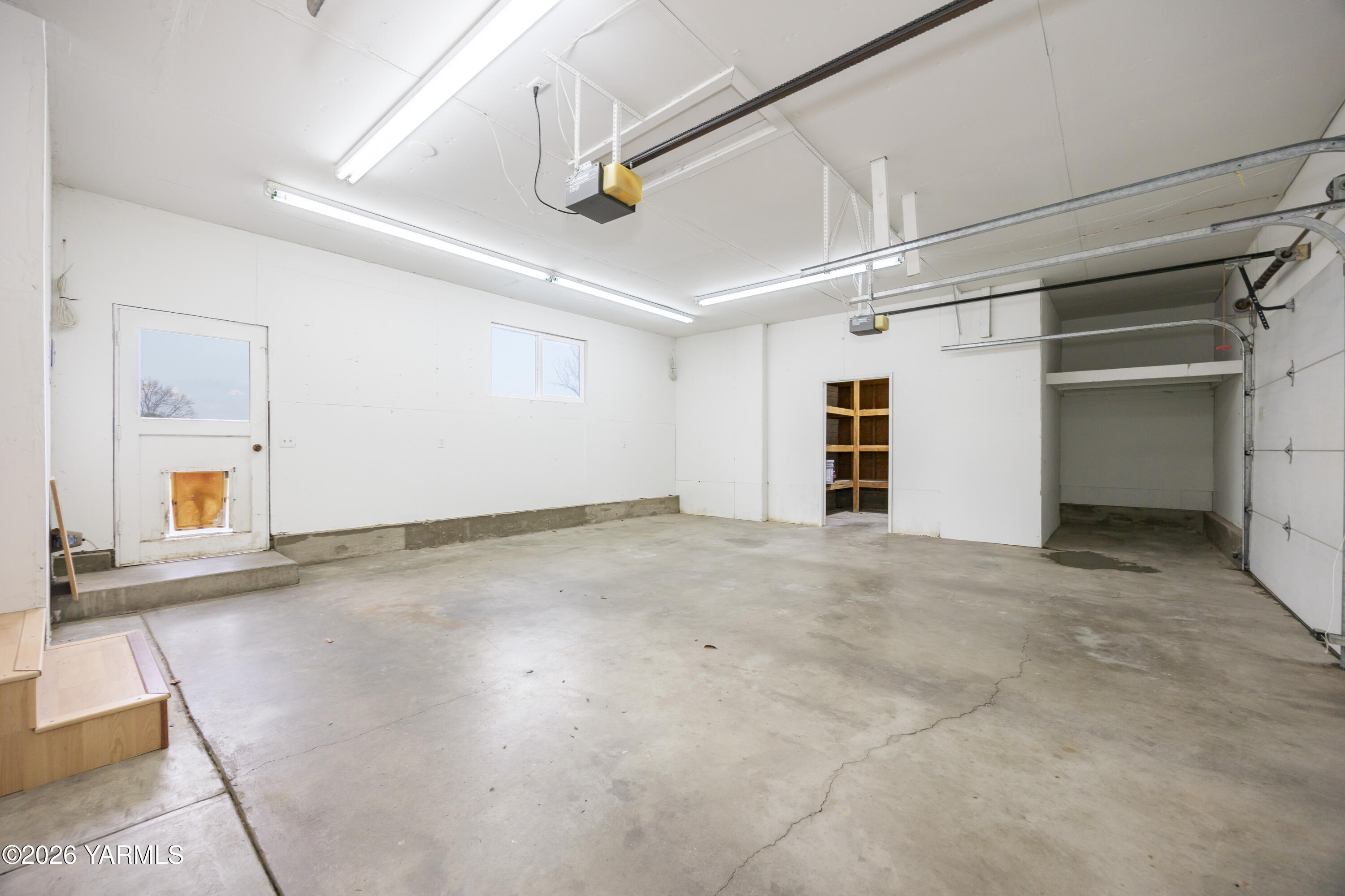 790 East Bonnieview Road Grandview, WA 98930 - Photo 40 of 49 a view of empty room with wooden floor
