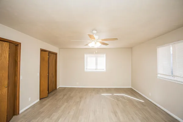 a bathroom with a sink a mirror and a shower
