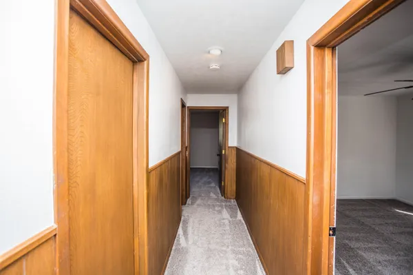 a bathroom with a toilet and a bathtub